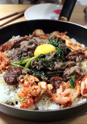 A picture of Stone-Cooked Style Bulgogi and Bibimbap.