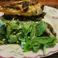 Chicken breast with baby romaine over bed of spinach A picture of Chicken breast with baby romaine over bed of spinach.