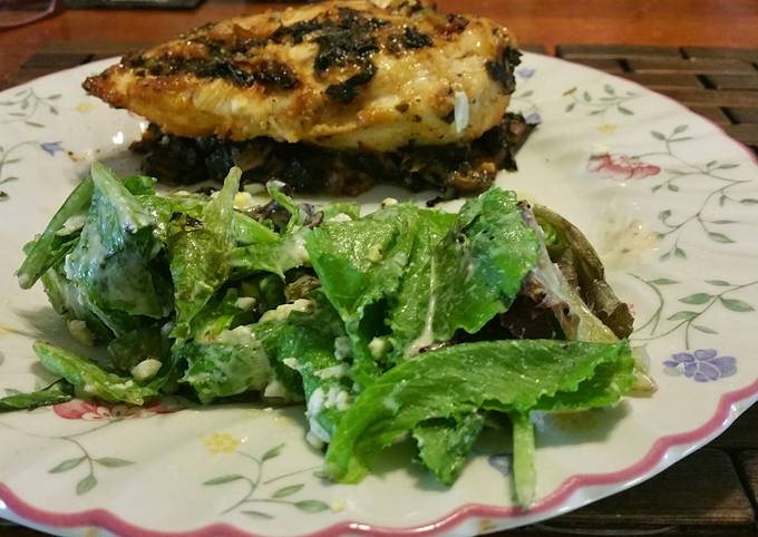 Chicken breast with baby romaine over bed of spinach