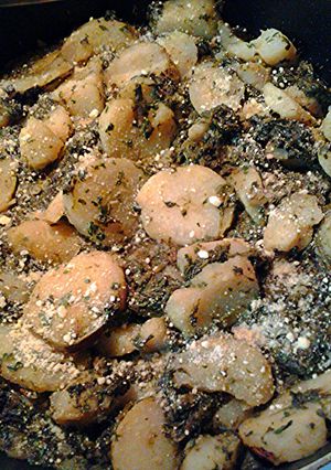A picture of Italian potatoes with spinach.
