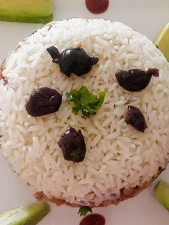 Una foto de Arroz Tapado con Pollo a lo Carmelita