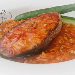 A picture of Salmon With Carrot Plum Sauce.