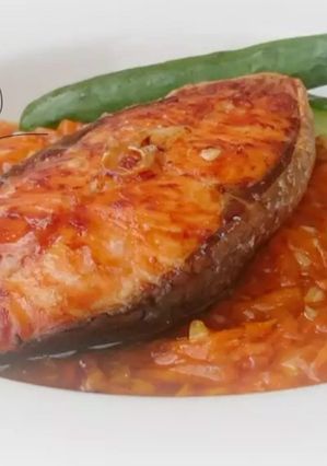 A picture of Salmon With Carrot Plum Sauce.