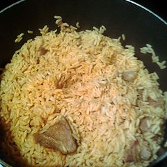 A picture of paprika rice and rib.