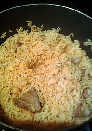 A picture of paprika rice and rib.