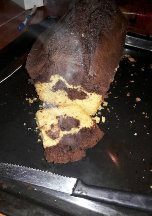 Una foto de Budín alto de naranja y chocolate