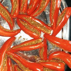 A picture of Stuffed Red Chilli pickle🌶️.