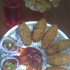 A picture of Chicken and potato cigars.