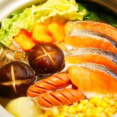 A picture of Salt and Butter Hot Pot with Salmon and Vegetables.