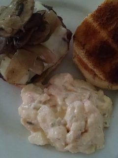 A picture of Big Daddy's Bacon wrapped Black and Blue Burgers.