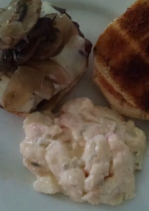 A picture of Big Daddy's Bacon wrapped Black and Blue Burgers.