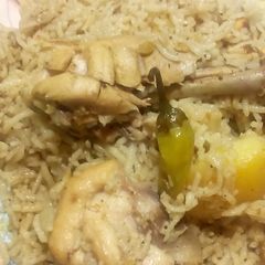 A picture of Rich Rice with Chicken.
