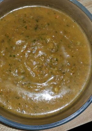A picture of Vegetables soup with chicken.