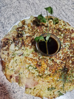 Una foto de Okonomiyaki