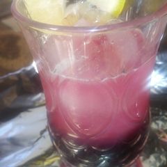A picture of Two colored drink.