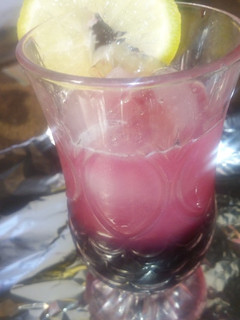 A picture of Two colored drink.