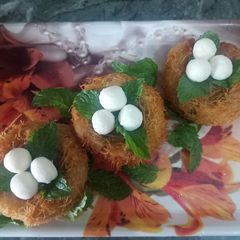 चिड़िया का घोसलें की तरह दिखने वाला स्नैक्स/Bird Nest snacks A picture of चिड़िया का घोसलें की तरह दिखने वाला स्नैक्स/Bird Nest snacks.