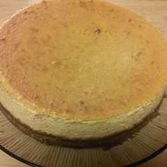 A picture of Chai Pumpkin Cheesecake w/ Ginger Crust.