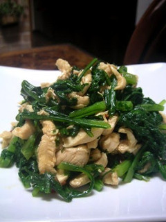 A picture of Tender Chicken Breast and Chrysanthemum Greens with Garlic and Soy Sauce.