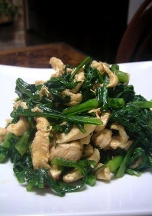A picture of Tender Chicken Breast and Chrysanthemum Greens with Garlic and Soy Sauce.