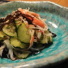 A picture of Mozuku Seaweed and Imitation Crab Sticks in Vinegar.