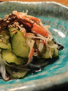A picture of Mozuku Seaweed and Imitation Crab Sticks in Vinegar.