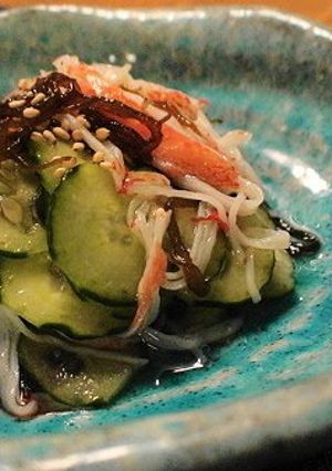A picture of Mozuku Seaweed and Imitation Crab Sticks in Vinegar.