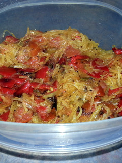 A picture of Roasted red pepper and tomato with spaghetti squash and fresh herbs.
