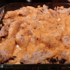 A picture of Cheesy chicken and rice.