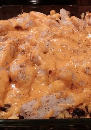 A picture of Cheesy chicken and rice.