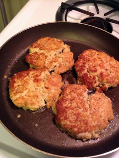 A picture of Salmon Patties And Dill Sauce.