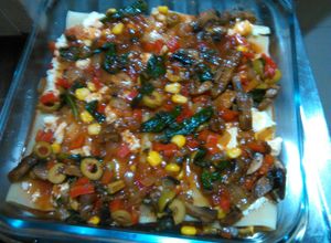 Una foto de Canelones rellenos de espinacas y hongos portobelo