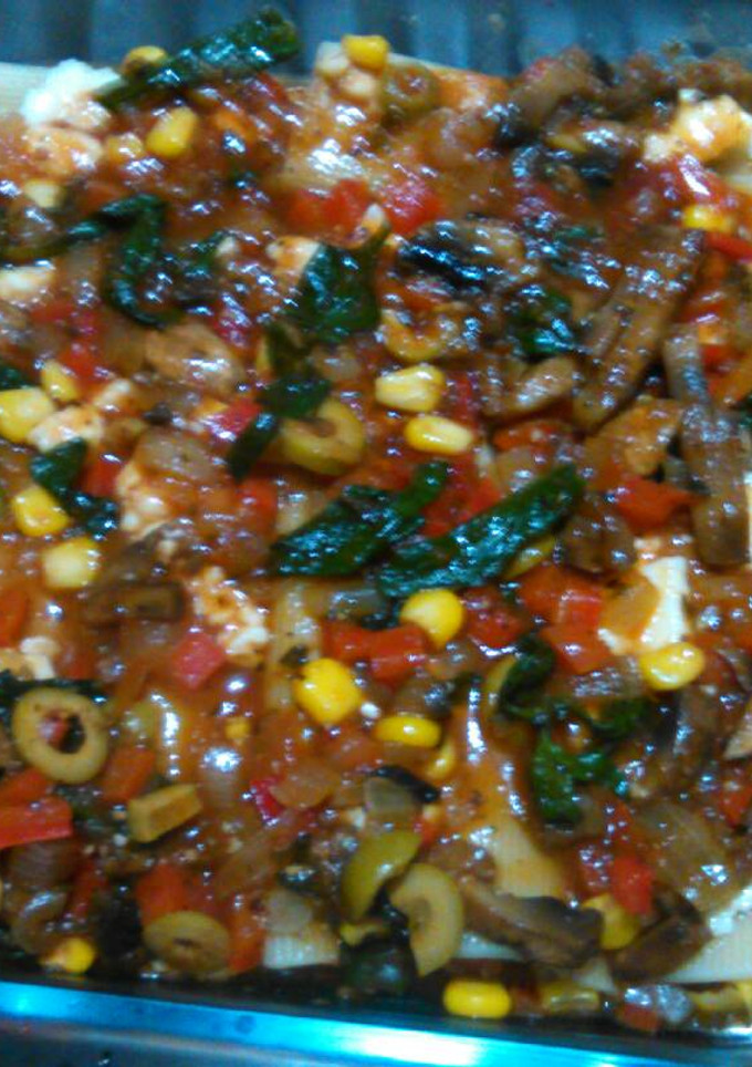 Una foto de Canelones rellenos de espinacas y hongos portobelo