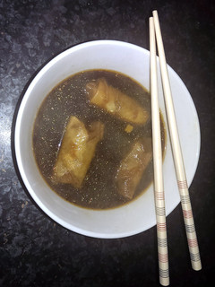 A picture of Sophie's lime chili beef spring roll dumpling soup.