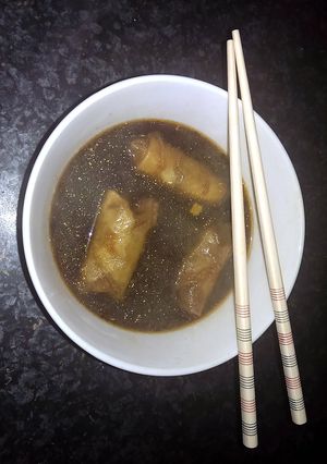 A picture of Sophie's lime chili beef spring roll dumpling soup.