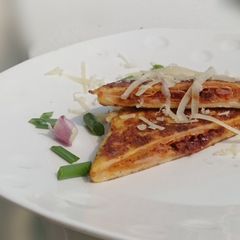 A picture of French Toast With Ham And Pesto.