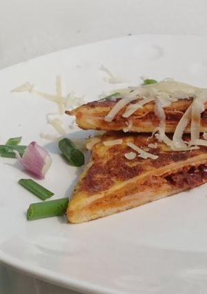 A picture of French Toast With Ham And Pesto.