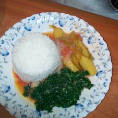 A picture of Matoke with rice and Spinach.