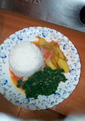A picture of Matoke with rice and Spinach.