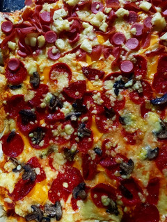 Una foto de Pizza