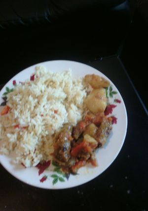 A picture of Chicken stew with rice.