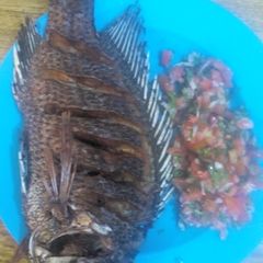 Fried fish with kachumbari A picture of Fried fish with kachumbari.