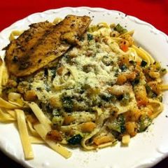 A picture of Shrimp zucchini pasta and tilapia.