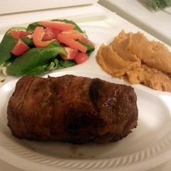 A picture of Paleo Bacon Wrapped Pork Chops with Sweet Potato Mash.