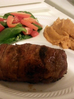 A picture of Paleo Bacon Wrapped Pork Chops with Sweet Potato Mash.