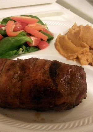 A picture of Paleo Bacon Wrapped Pork Chops with Sweet Potato Mash.