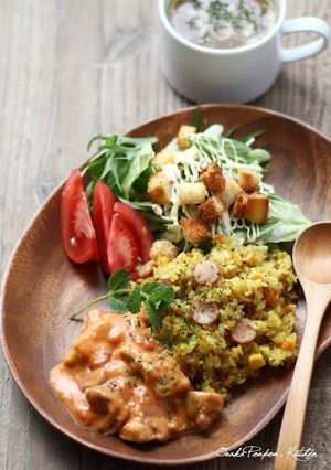 A picture of Curry Pilaf with Chicken in Tomato-Cream Sauce.