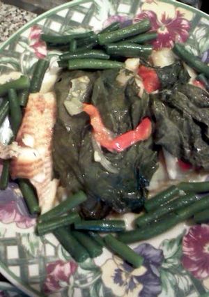 A picture of Steamed fish with Hierva Santa.