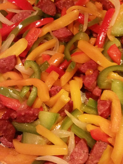 A picture of Sausage and pepper dish.