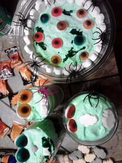 A picture of Monster Eyes n Slime Oreo Layered Dessert ~ halloween.